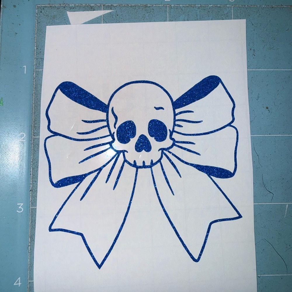 Blue Skull and Bow Graphic